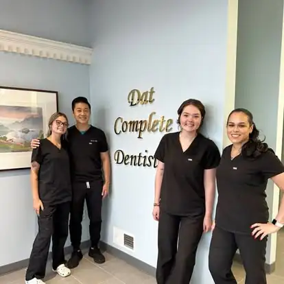 Dr. Dat with the Dat Complete Dentistry team