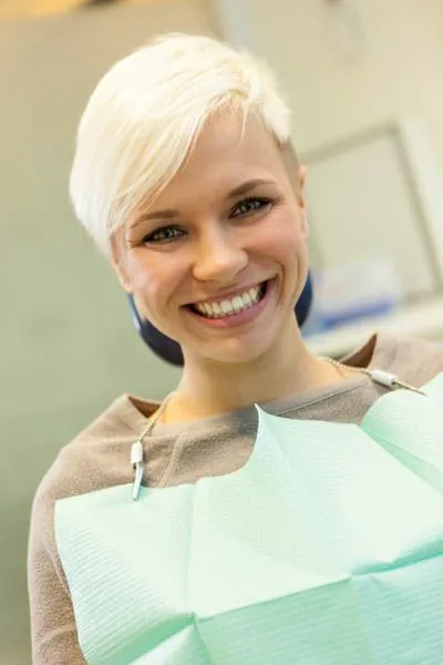 woman smiling at Dat Complete Dentistry
