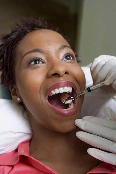 woman's first visit to Dat Complete Dentistry